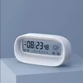 Smart white digital alarm clock with large LCD screen showing time and weather icons - Pearl White (Battery Version)
