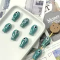 Detailed view of fish-shaped turquoise ceramic beads for DIY jewelry making and crafts - Blue Howlite