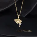 Detail of graduation necklace with golden mortarboard charm and heart crystal pendant - Letter Q