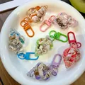 Schelp sleutelhanger met vloeibaar zand en mini schelpen in zes macaron kleuren - karabijn sluiting / Multicolor kleine schelp