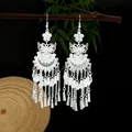 Orecchini pendenti in argento con motivi a farfalla e dettagli in filigrana etnica - Nappa Filigranata a Ventaglio e Farfalla (E2437-3) / Argento