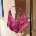 Metallic magenta snakeskin hobo bag with gold hardware in a modern crescent shape - Rose Red
