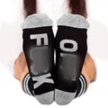 Black and grey cotton crew socks featuring white 'FUCK OFF' lettering on the soles - One Size / Black with Grey Text