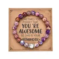 Close-up of 8mm heart-shaped beaded bracelet displayed on a kraft paper card - With Card / Imperial White Turquoise