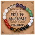 Detail view of 8mm gemstone heart bracelet set on a decorative kraft paper card - Multicolor 030 Style / With Card / Rainbow