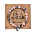 Detail of pink zebra stone beaded bracelet with silver heart charm on kraft paper card - With Card / Pink Zebra Jasper Heart