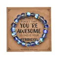 Close-up of blue frosted beaded bracelet with gold rhinestone spacers on gift card - Moonlight Blue Ribbon Card / With Card