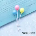 Balloon cake topper with blue pink yellow pearls and a bow, height approx 13cm - Three Color Round Balloon Topper