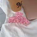 Pink marble acetate hair claw clip for women featuring a minimalist shark clip design - Large Multi-Tooth