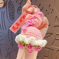 Handmade crochet pink dress keychain with flower details and a small pink bell charm - Pink Rose (with 'No Troubles' Tag)