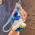Handmade crochet blue bell keychain with light blue braided lanyard and metal clasp - Double Rope Blue Rose (Wishes Come True)