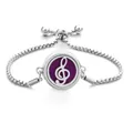 Silver treble clef essential oil diffuser bracelet with purple pad and bolo sliding clasp - Treble Clef / Screw Twist Opening