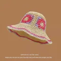 Handcrafted beige straw sun hat with purple and magenta floral accents and wavy brim - M (56-58cm)