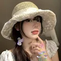 Women's woven straw hat with wide white lace brim and delicate floral embroidery details - M (56-58cm) / Pearl White Lace - Beige