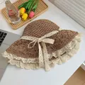 Elegant khaki straw sun hat featuring delicate white lace trim and a bow detail - M (56-58cm) / Hollow Ribbon - Khaki