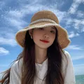Beige woven straw sun hat with elegant white pearl trim for beach vacations - M (56-58cm) / Pearls - Khaki