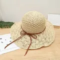 Beige hand-woven straw sun hat with large wavy brim and brown bow tie detail - M (56-58cm) / Beige with Bow