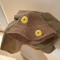 Brown woven straw sun hat with yellow floral accents and elegant wide brim design - M (56-58cm) / Sunflower - Khaki