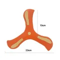 Close-up of three-wing EVA foam boomerang with dimensions 23cm width and 13cm wing radius - Bulk/Loose Packaging / Orange