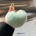 Mint green plush heart keychain with gold metal ring held in hand for bag decoration - No Keychain / Mint Green