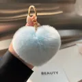 Porte-clés cœur en fausse fourrure de lapin bleu clair avec anneau doré - Bleu Azur