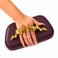 Dettaglio della pochette da sera in pelle PU viola scuro con manico a scultura dorato - Borgogna