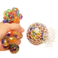 Stress relief mesh squishy ball with colorful water beads shown in squeezed state - One 6cm Netted Grape Ball (buy 12 And Get A Free Color Box)