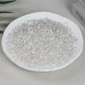 Polished transparent clear quartz crystal chips for home decor and DIY projects - 100g Of High-quality White (5-7mm)