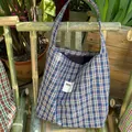 Classic blue, red, and white plaid canvas tote bag with a minimalist shoulder strap - Blue and Green Plaid