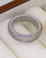 Silver 6mm stainless steel elastic snake ring with ribbed tubogas texture in a jewelry box - US 7 / Silver