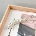 Elegant banana hair claw clip with gradient pearls on an ivory transparent base - No. 18 Pearl Pea Pod