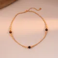 Detailed shot of golden tiger eye stone beaded necklace with elegant heart charm pendant - 8# Necklace-Gold-Brown