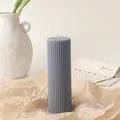 Macro detail of a grey ribbed cylindrical soy candle on rustic brown paper decor - 5*15cm / Gray