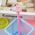 Pink squirrel gel pen with a cute strawberry charm accessory in a blue pencil holder - 0.5mm Black Refill / Pink Long Tail