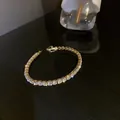 Elegant gold-plated tennis bracelet featuring a single row of sparkling zircon stones - Gold (Full Diamond Tennis Bracelet)