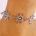 Elegante cavigliera vintage argentata con spirali solari e pietre di cristallo lucenti. - Cavigliera (A-1290) / Argento