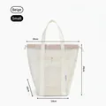 Small beige mesh beach bag with drawstring closure and durable woven handles - Small / Beige