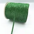5mm green glitter velvet ribbon with shimmering gold finish on white spool for DIY crafts - Glitter Webbing (06.)