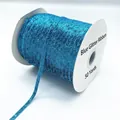 Blue glitter velvet ribbon on white spool for DIY gift wrapping and decoration - Glitter Webbing (07.)