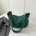 Dark green corduroy crossbody bag with a cute white puppy plush charm for women - Dark Green