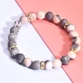 Bracciale di pietre naturali zebra rosa 8mm con distanziatori dorati e strass su sfondo bicolore - 8mm Oro Opaco Zebra Rosa (A+7+10)