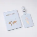 Detail of light blue PU leather travel set with gold embossed world map and passport cover - Luggage Tag / Light Blue