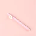 Light pink retractable neutral pen featuring a decorative white pearlized flower clip - Pink