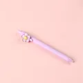 Cute purple floral retractable gel pen with creative flower clip for school and office - Purple