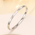 Detail of silver titanium steel bracelet with roman numeral engraving and side clasp - 39# 4mm Roman Numeral Polished Steel Color Sz644
