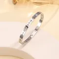 Macro detail of silver titanium bangle with Roman numerals and inlaid crystal diamonds - 46# 6mm Hollow Roman Pattern - Steel Color Sz654