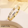 Detail of 18k gold plated stainless steel bangle with shell inlay and diamonds - 13# Gold Sz628