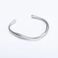 Minimalist irregular open titanium bangle with smooth silver finish and bulbous ends - 5# Irregular - Steel Color Sz656