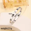 Polished silver titanium steel bangle with embedded rhinestones and circular motifs - #7 Ten Diamonds - Steel Color Sz636