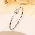 Silver plated stainless steel bangle with sparkling zircon pavé and moving center ring - 11# Slim Waist - Steel Sz632